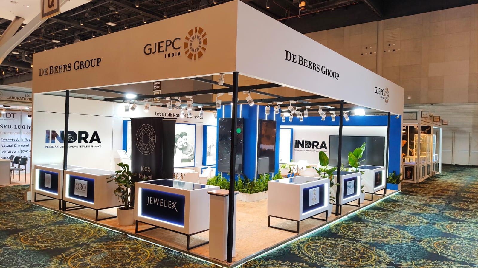 Custom trade show booth by Silverline. De Beers at India Gem & Jewellery Show 2026, view 2